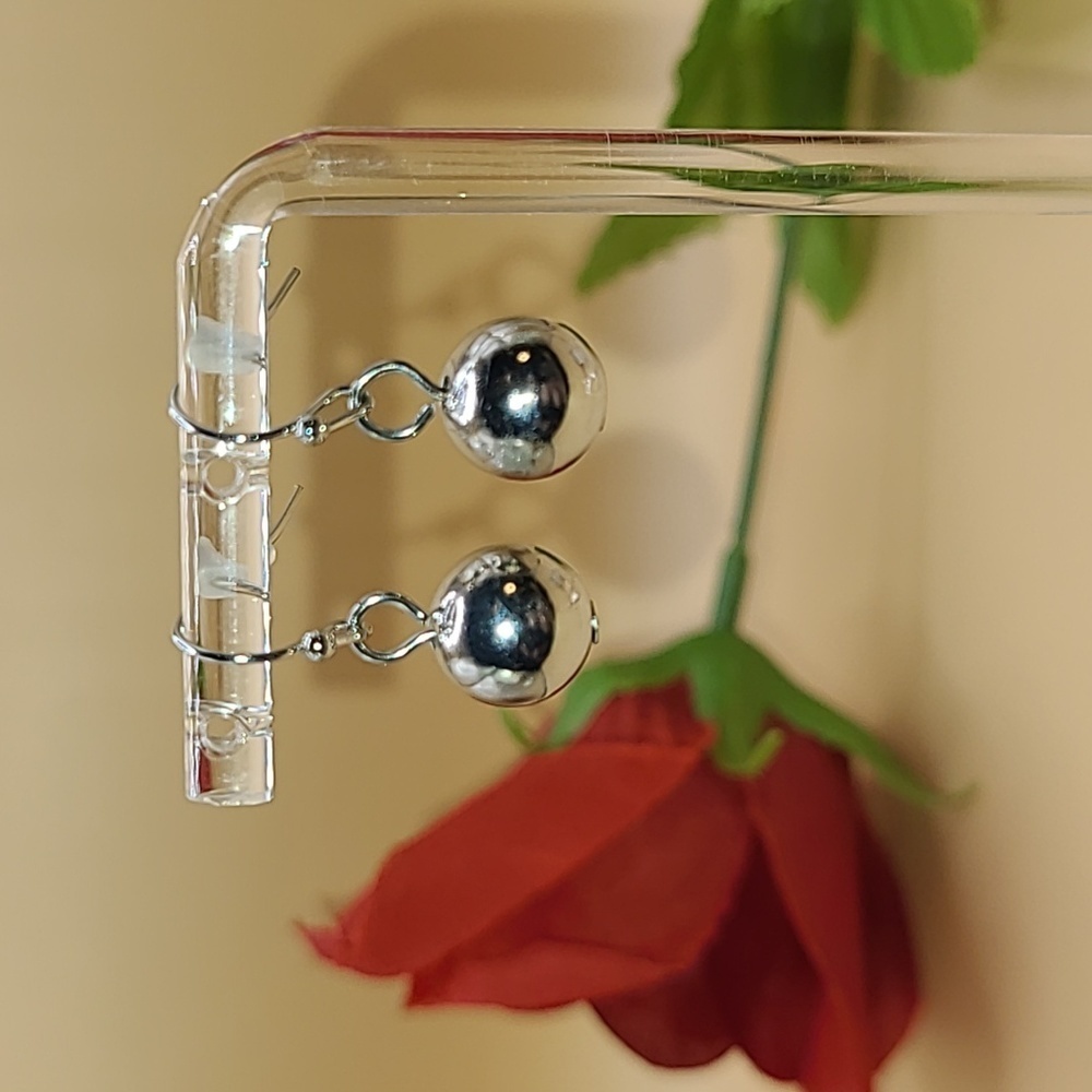 Silver color dangle ball earrings